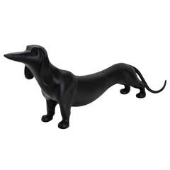 Adorno resina perro negro 46x7x17 cm.